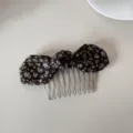 Detailed view of a vintage style floral print bow hair comb featuring silver metal teeth - Hair Comb (Coffee Floral Bow) / Brown