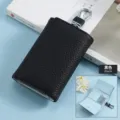 Black genuine leather folding key case featuring pebble grain texture and metal hook - Black