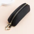 Petit porte-monnaie en cuir noir grainé avec fermeture éclair dorée et anneau - Noir