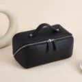 Schwarze Kosmetiktasche aus echtem Leder mit Doppelreißverschluss und praktischem Griff - Schwarz