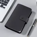 Black leather commemorative coin and banknote collection album with snap closure - Black