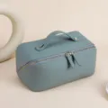Hochwertige blaue Leder-Kosmetiktasche mit Doppelreißverschluss und bequemem Tragegriff - Blau