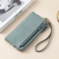 Portefeuille long pour femme en cuir véritable bleu poudré avec dragonne pratique - Bleu