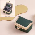 Dark green genuine leather mini jewelry pouch with gold clasp and polka dot lining - Dark Green