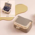 Premium grey genuine leather mini jewelry pouch for rings and coins with elegant gold clasp - Elephant Gray