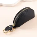 Étui à clés en cuir grainé noir haut de gamme avec fermeture éclair dorée et mousqueton métal - Noir