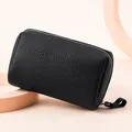 Neceser de maquillaje de cuero genuino negro portátil con textura granulada para viaje - Negro