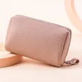 Elegante neceser de maquillaje en cuero granulado rosa nude para guardar cosméticos - Rosa