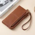 Portefeuille long en cuir grainé marron haut de gamme avec triple zip et dragonne pratique - Marron