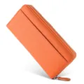 Orange leather long wallet detail view featuring smooth zipper closure and practical card slots. - Orange