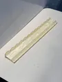 High-quality close-up of a 20-inch pearl white acrylic American Mahjong pusher rack - Shell Color