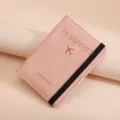 Pink travel passport wallet holder with elastic band and debossed lettering design. - Pink