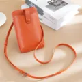 Minimalista bolso bandolera para móvil de piel auténtica naranja con grano de lichi y correa - Naranja
