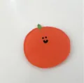 Süßer Untersetzer aus Acryl in Orangenform mit lächelndem Gesicht für Hitzeschutz - Orange