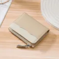 Premium beige genuine leather RFID blocking wallet for women featuring litchi grain texture - Beige