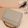Portefeuille femme élégant en cuir gris, pliable en trois avec protection RFID - Gris éléphant