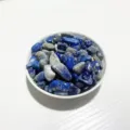 Natural blue lapis lazuli crystal gravel stones in a white bowl for home aquarium decoration - Lapis Lazuli / 100g Pack