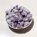 Polished natural purple crystal gravel stones in a white ceramic bowl for home decor - Plum Blossom Tourmaline / 100g Pack