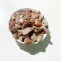 Natural pink moonstone crystal crushed stones in a white bowl for DIY home decoration - Orange Moonstone / 100g Pack