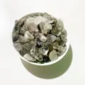 Polished natural crystal chips in a white bowl for DIY jewelry and home decoration - Phantom Quartz / 100g Pack