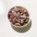 Natural purple and pink crystal tumbled stones for DIY decoration in a white bowl - Red Strawberry / 100g Pack