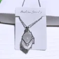 Elegant natural clear crystal pendant necklace with intricate silver metal cage design - White Crystal / Net Pocket Necklace