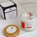 Elegant rose scented soy wax candle in clear glass jar with minimalist white gift box package - Rose