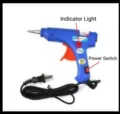 Detail of 20W mini hot glue gun featuring indicator light and manual power switch - Hot Melt Glue Gun Set