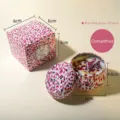Osmanthus scented soy wax candle in a patterned tin with a matching gift box - Fragrans