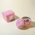 Handmade soy wax scented candle with dried rose petals in a pink floral tin box - Rose