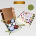 4-piece scented soy wax candle gift set featuring woody scents in elegant floral packaging - Woody Scent Set / 4-Piece Gift Box Set