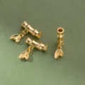 Three gold-plated S999 silver bamboo tubes with leaf charms for DIY jewelry crafting. - S999 silver plated gold