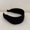 Close-up of black retro wide headband with ribbed fabric texture for women - Wide Headband / Black