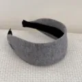 Detailed macro view of a premium gray knitted wide-brim headband with soft texture - Wide Headband / Gray