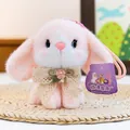 Adorable pink plush bunny pendant with a lace bow detail and soft faux fur texture - Pink Rabbit / 15cm