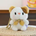 Adorable Cute Milk Bean series plush puppy doll keychain with yellow polka dot bow on woven mat - Sitting Posture / Sitting Kitten