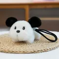Cute plush dog keychain bag charm from the Milky Bean series in white and black - Prone Puppy