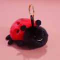 Adorable plush ladybug keychain with red and black spots and a golden metal ring - Ladybug / 13cm