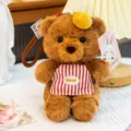 Adorable plush bear keychain charm wearing a red striped apron for backpack decoration - Bear with Apron / 16cm