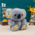 Adorabile peluche a forma di koala grigio con orecchie e piedi a motivi floreali - 10cm / Koala Floreale