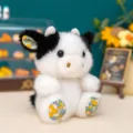 Adorabile portachiavi peluche mucca in miniatura con dettagli floreali su orecchie e zampe - 10cm / Mucca Floreale