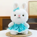 Adorable white plush bunny doll wearing a turquoise princess dress with a bow detail - Blue Rabbit