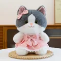 Cute grey and white cat plush toy wearing a pink princess dress with bows. - Pink Cat