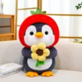 Cute penguin plush toy wearing a strawberry hat and holding a bright yellow sunflower. - Penguin Holding Flower / 20cm / Gray