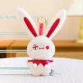 Soft white plush rabbit keychain with red eye-patch and collar detail for Easter gifts - Bean Style / 14cm