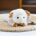 Adorable oveja de peluche blanca en posición tumbada para decoración de escritorio - Aries / 20cm