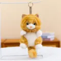 Cute orange and white long-haired cat plush keychain shown in an indoor setting. - 16cm / Yellow Stripes