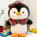 Süßes Pinguin-Plüschtier mit einer roten Karomütze und passendem Schleifenumhang - 25cm / Roter Karohut