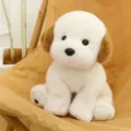 Adorable soft white plush puppy doll with brown ears sitting on a cozy canvas chair - Labrador / 18cm