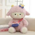 Adorable pink lamb plush toy with blue crossbody bag and red gingham strap detail - Sheep with Bag / 25cm / Pink